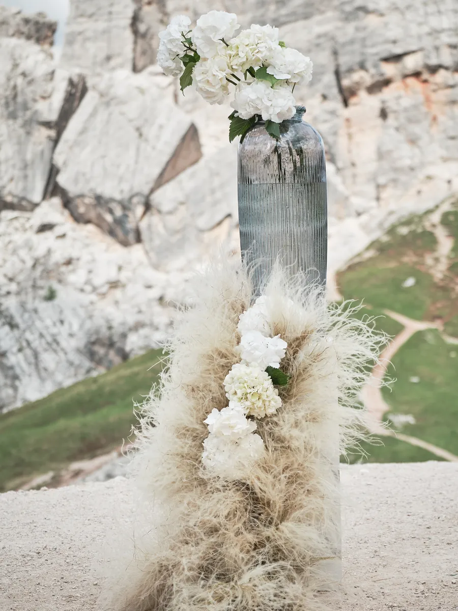 White flower arrangement among Dolomite rocks