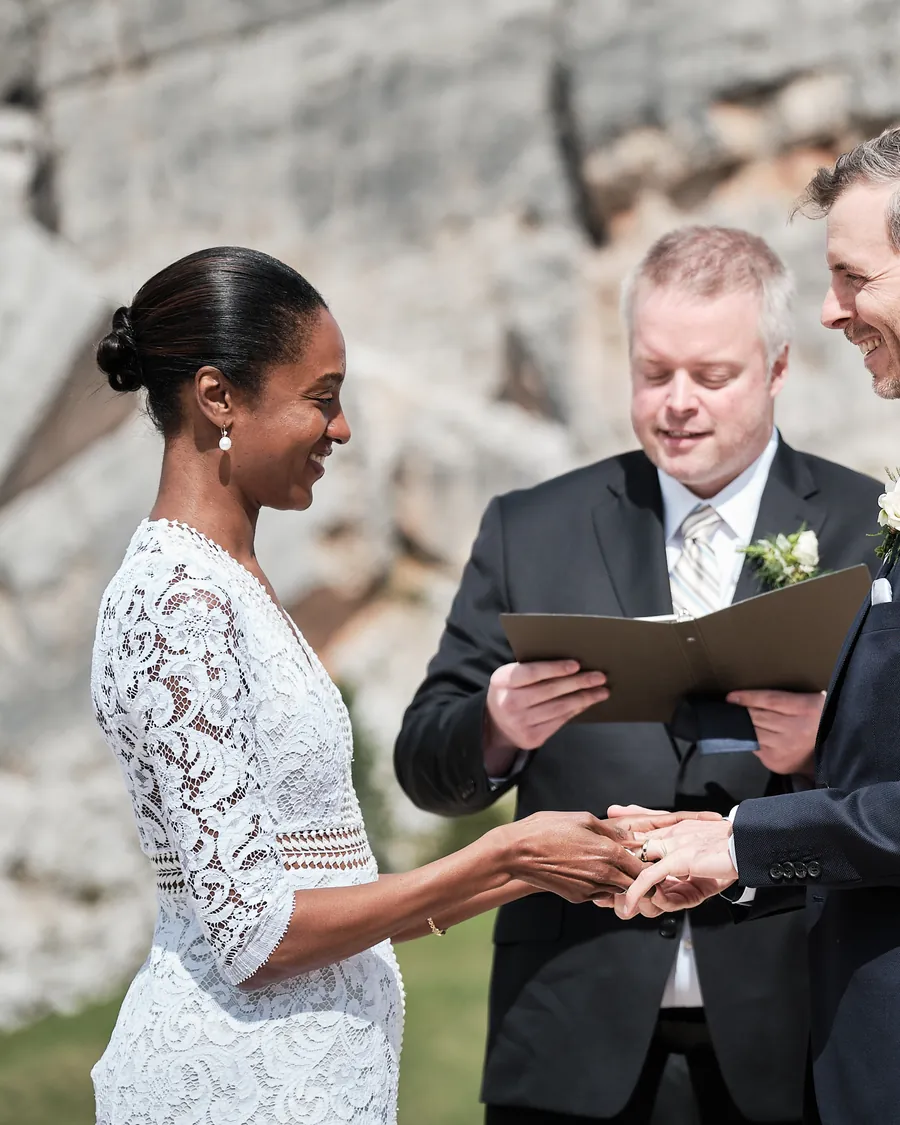 Bride and groom during their vows at the Cinque Torri