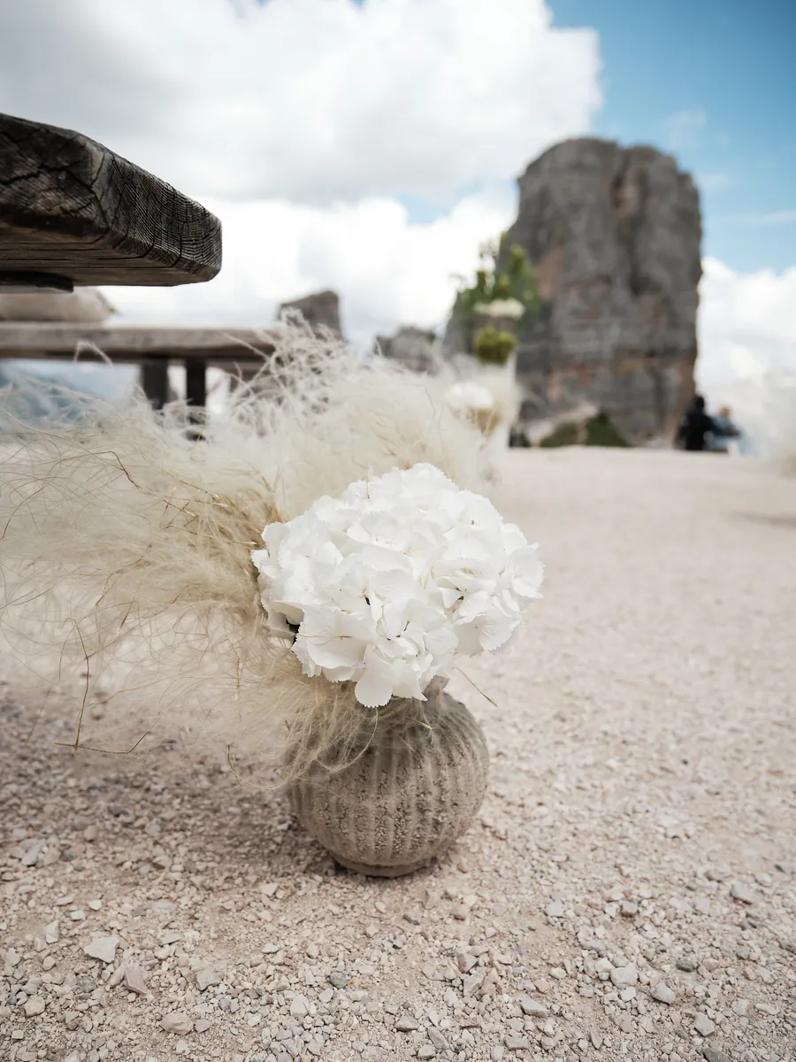 Flowers and the Cinque Torri on a wedding day