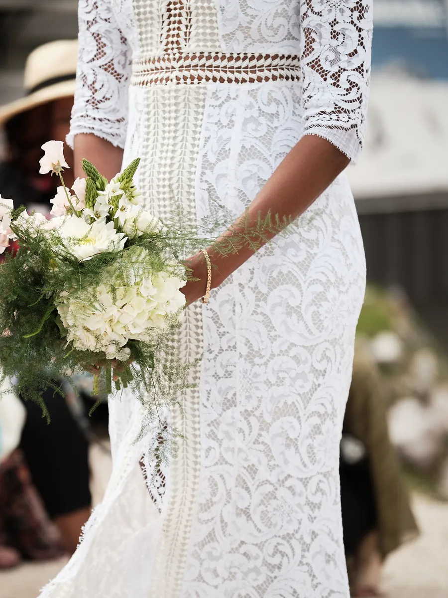 Bridal bouquet of white flowers at a Dolomites ceremony