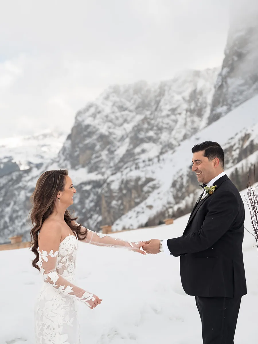 Couple exchanging vows during a private elopement in the snow