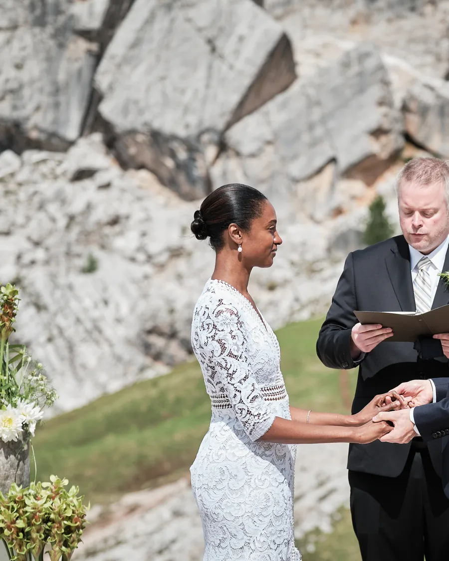 Ring exchange during a wedding at the Cinque Torri