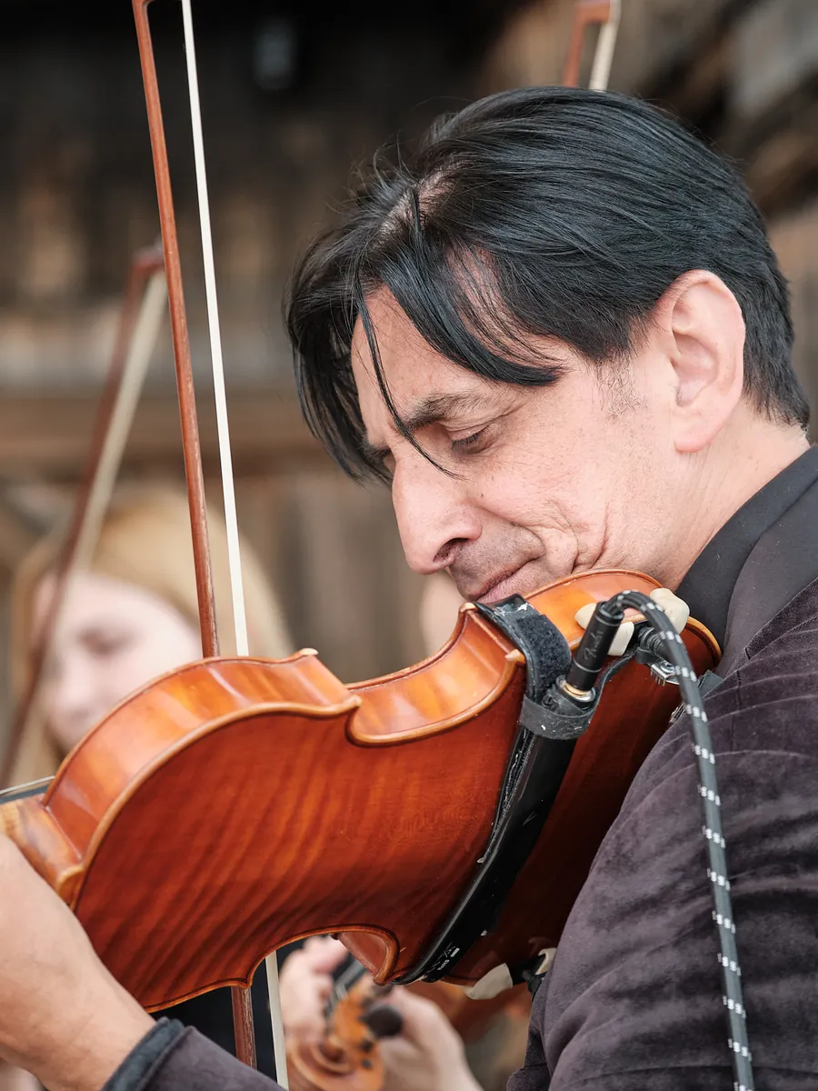 Violinist playing at a wedding celebration