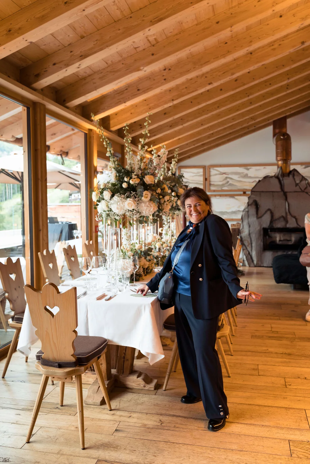 Wedding planner Viviana Verzi Reatti checking the set-up at Dolomiti Lodge Alverà