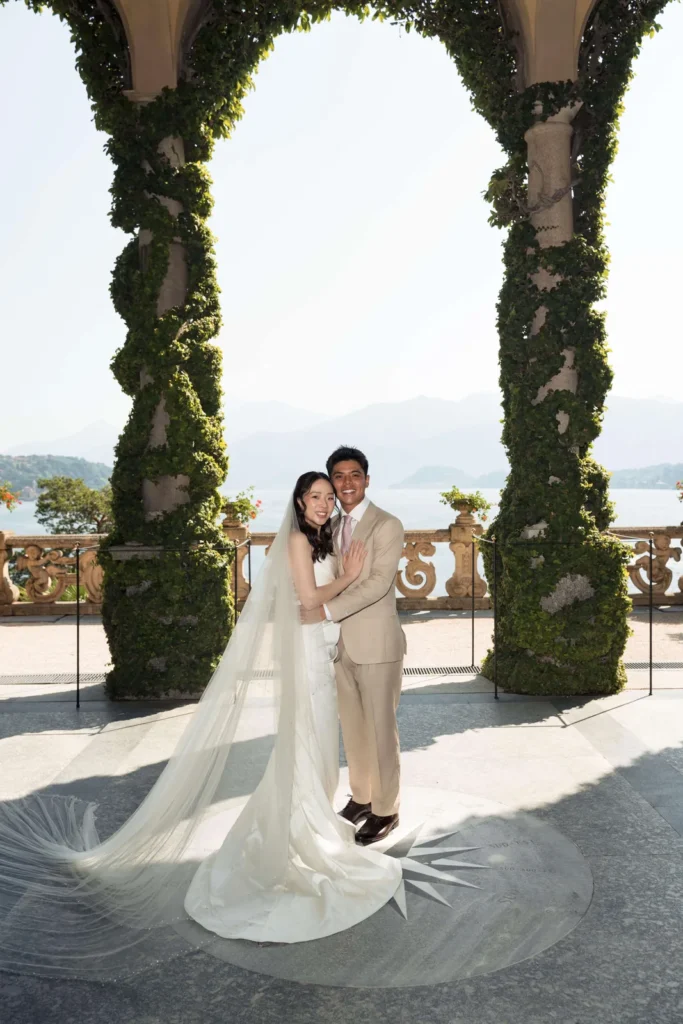 Couple under the ivy loggia of Villa del Balbianello, Lake Como
