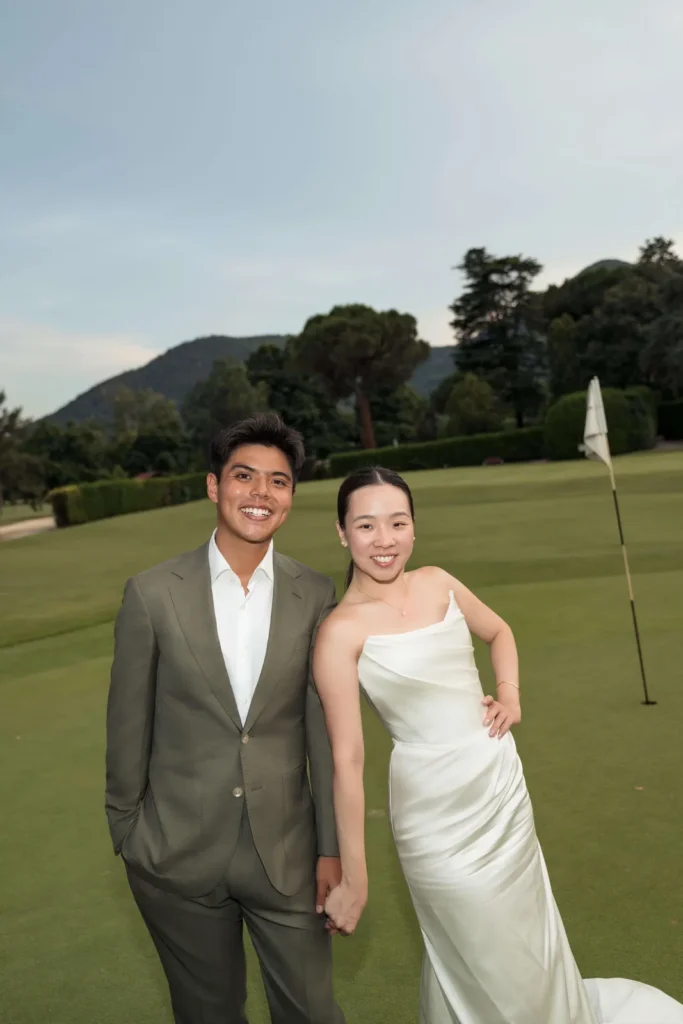 Bride and groom in wedding attire on the golf course near Padua