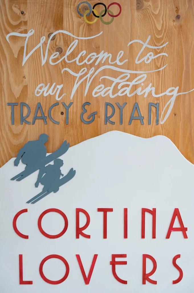 Ski-themed welcome sign for Tracy and Ryan's wedding in Cortina