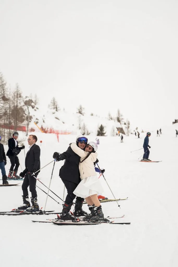 Bride and groom skiing together on the Cortina slopes